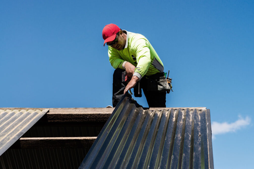 Photo of a tradie working on a roof